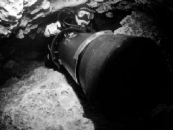 Diver scootering through Jackson blue cave in Marianna FL. by Becky Kagan 